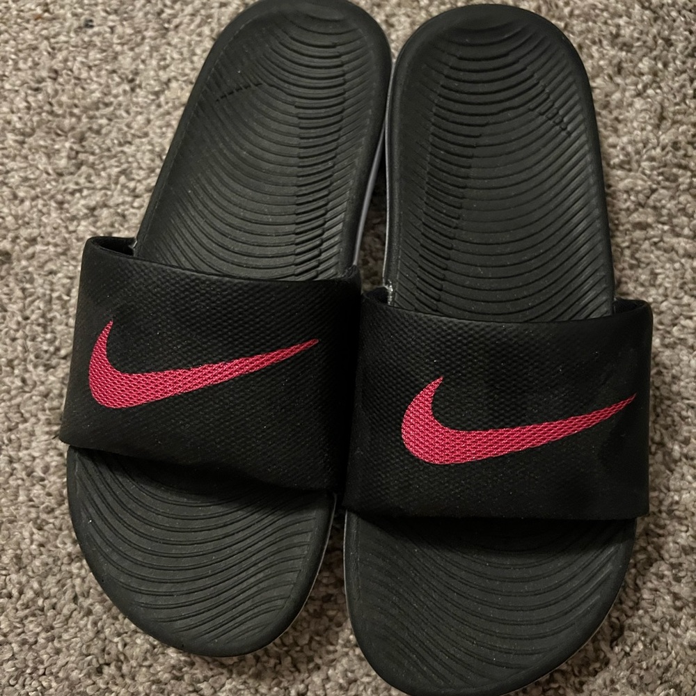 Black Nike slides size 7.